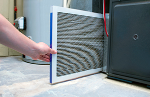 Changing filter in air conditioning unit