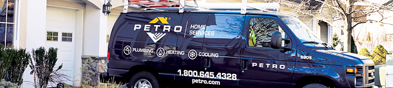 Petro servicemen in front of van